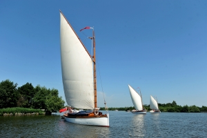 Wherry yachts (L-R) White Moth, Olive and Norada on Ranworth Broad.  Photo: Courtesy of the Broads Authority